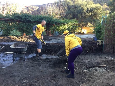 Scientology Volunteer Ministers helping neighbors dig out from the mudslides in La Tuna Canyon in Burbank, California.