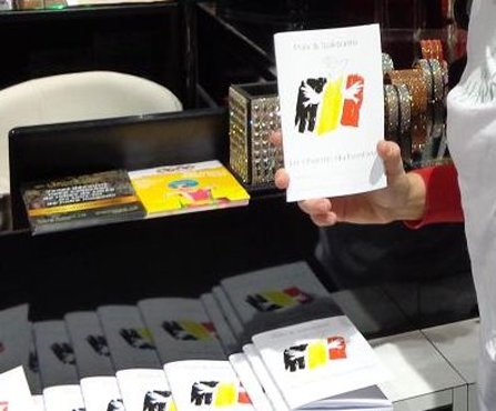 A similar booklet was produced for Belgium in the wake of the March 2016 terrorist attacks, bearing the Belgian flag.