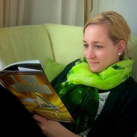 Ariane reading Dianetics 55! book by L. Ron Hubbard