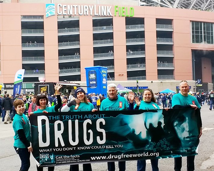 The Drug-Free-World volunteers brought their drug prevention campaign to CenturyLink Field on a game night to share the program with Seahawks fans.