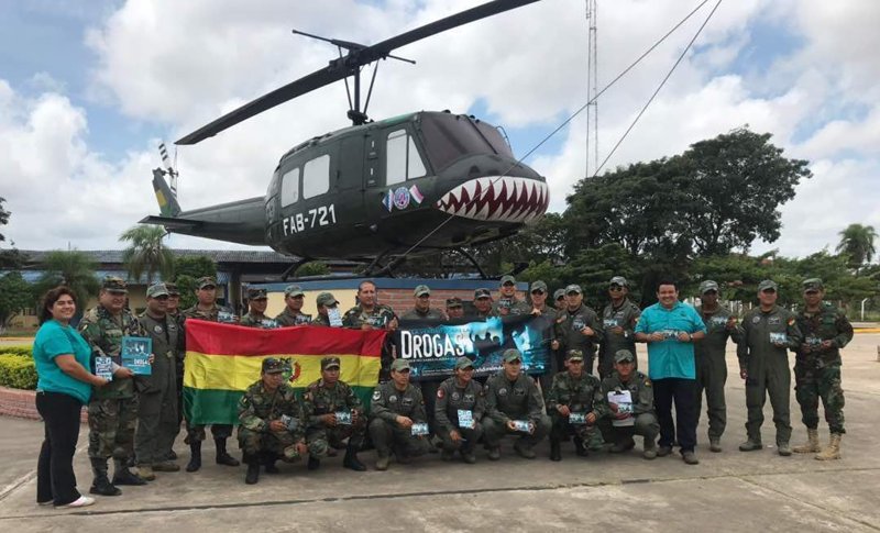 Bringing a squadron of the Bolivian Air Force on board and drug prevention advocates