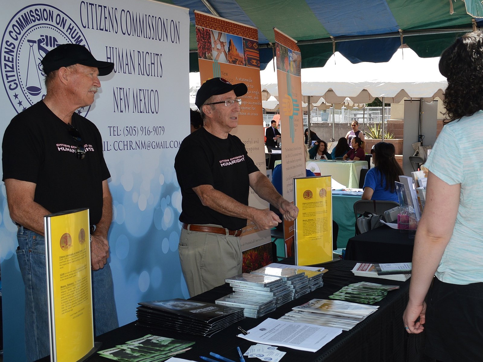CCHR volunteers brief visitors at their booth at the Bernalillo County, New Mexico, Mental Health Awareness Day event.