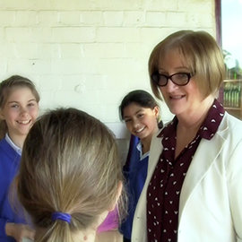 Sydney Scientologist Fiona Milne with kids in class