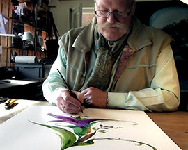 Carl W. Röhrig painting at desk