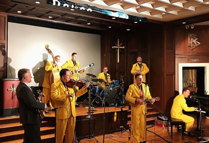The Jive Aces Swing into Health concert at the Nashville Church of Scientology World Health Day Concert. Church pastor, Rev. Brian Fesler (left) joins them on banjo.