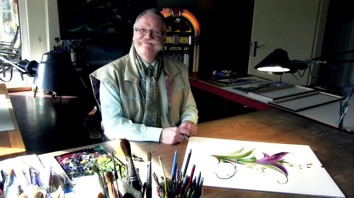Carl W. Röhrig at his desk with paintings