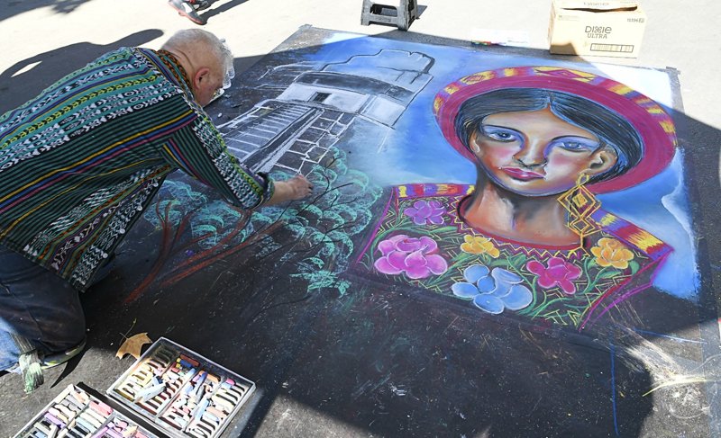 A chalk mural highlighting Guatemalan cultural themes created in the parking lot of the Church of Scientology Los Angeles.