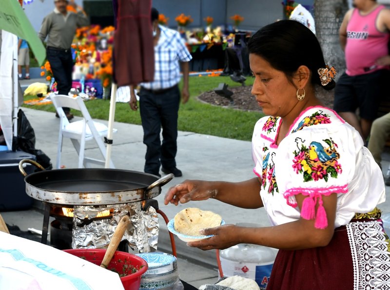 Preparing some of the favorite foods of the region including those only served on Dia de Los Muertos