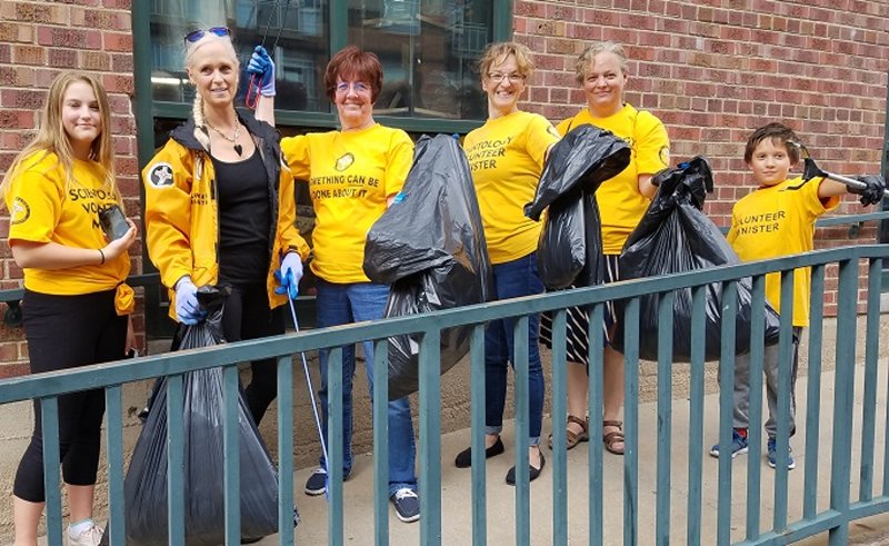 Scientology Volunteer Ministers clean up Ballpark Neighborhood streets and allies after recent games.