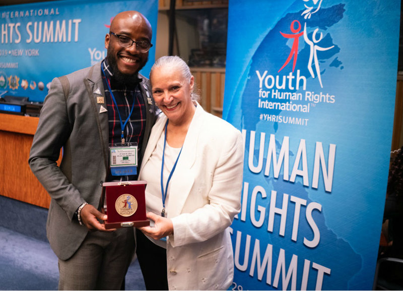 Rev. Travis Ellis presented the Human Rights Hero Award