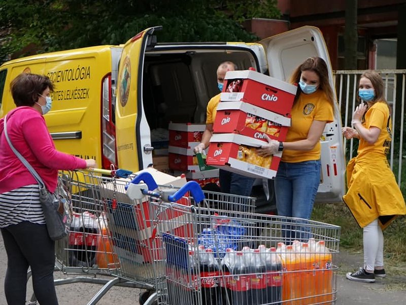 In preparation for the event, they loaded their bright yellow Volunteer Ministers van with chips, baked goods and soft drinks.