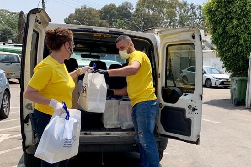 Scientology volunteers distributed food and other supplies to those in need.